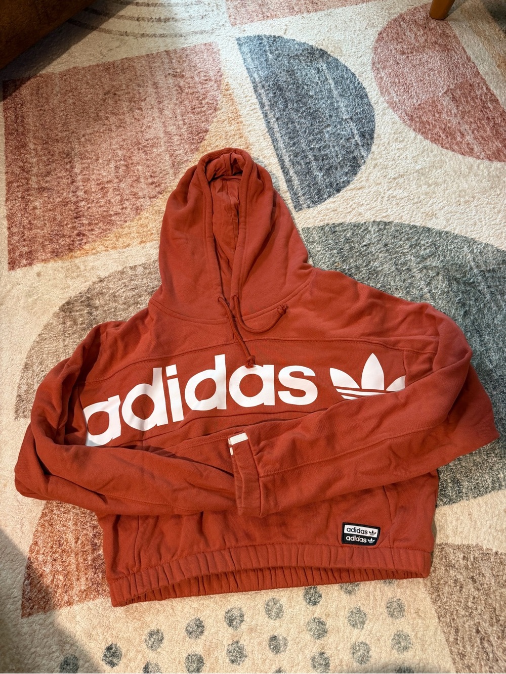 adidas Rust Orange Pullover Hoodie with Black Trefoil Tag